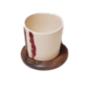 Short glass with wooden coaster